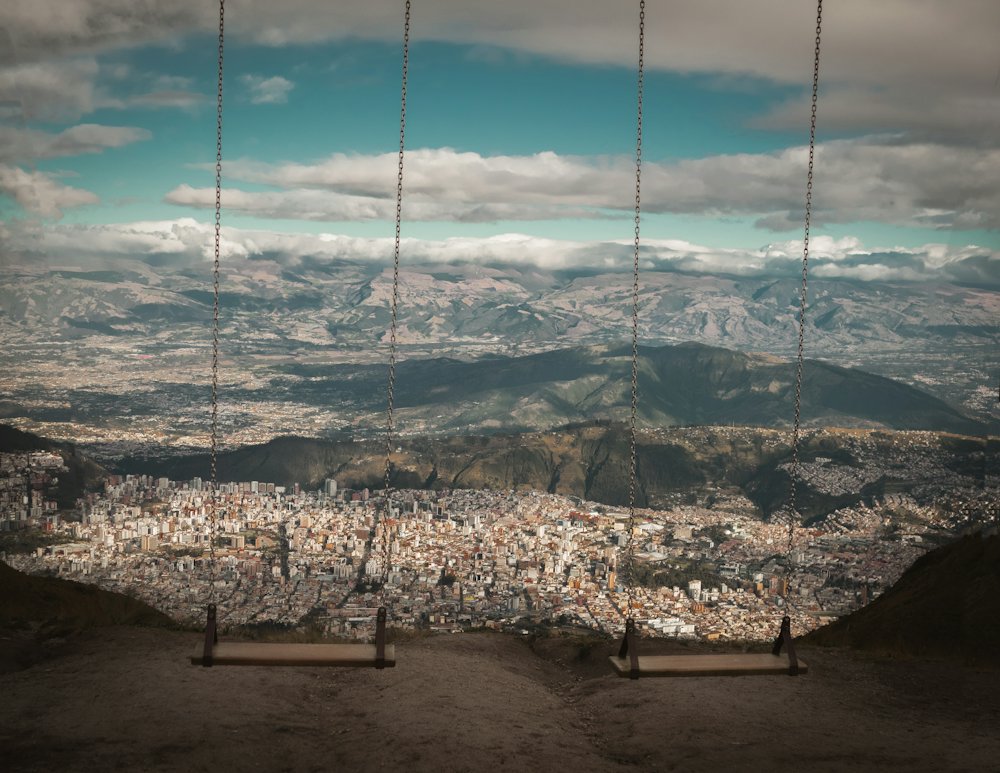 Swings on a mountain lookout high above Quito